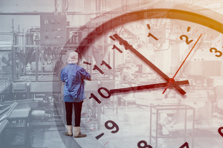 Factory worker work in plant factory process line overlay time clock. Industry factory working hours welfare conceptの写真素材