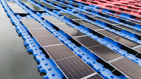 Drone view of Floating Solar Panel. Solar photovoltaic panel PV System in Industry lake water pond. Saving Energy with Clean Power.の写真素材