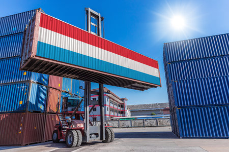 Products shipping cargo goods with Luxembourg flag for import export business from Port of Mertert Luxembourg countryの写真素材