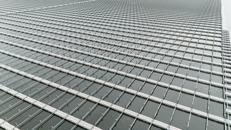 Water buoy platform array prepared for Floating Solar Panel. Solar photovoltaic panel PV System in Industry lake water pond under construction. Saving Energy with Clean Power.の写真素材