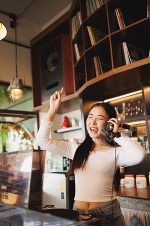 DJ Asian women young teen with music player, party sound entertainment happy smiling expressionの写真素材