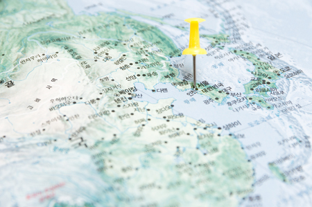 Close up of Seoul South Korea map with yellow push pinの写真素材