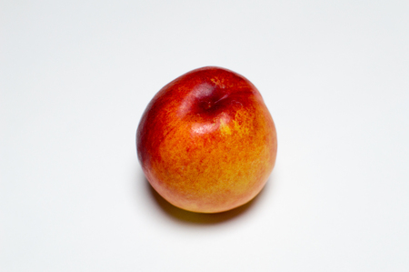 peach on white backgroundの写真素材