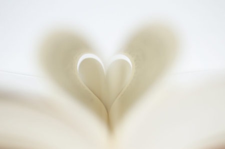 Pages of a book forming the shape of the heart
