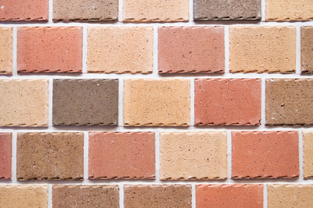 Brick wall background, texture of red stone blocks closeupの写真素材
