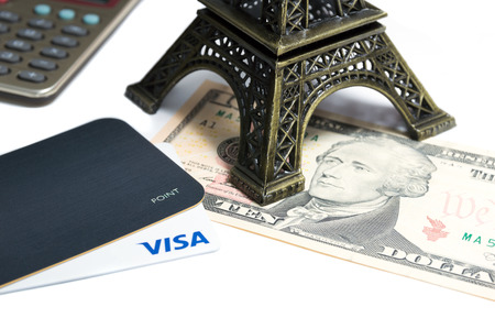 Daegu, South Korea - September 13, 2017 : Dollar - money, finances and travel concept with Eiffel tower replicaのeditorial素材