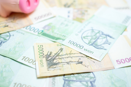 Korean money and piggy bankの写真素材
