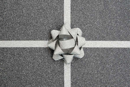 black gift box with silver ribbonの写真素材