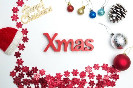 Merry christmas text and christmas decorations on white backgroundの写真素材