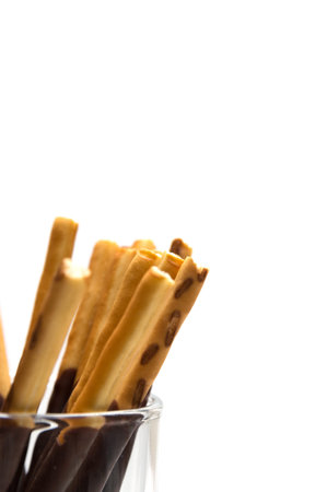 Chocolate Filled Biscuit Sticks on White Background
