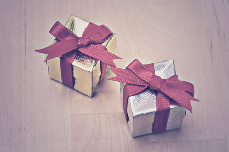 Gift box with red ribbonの写真素材