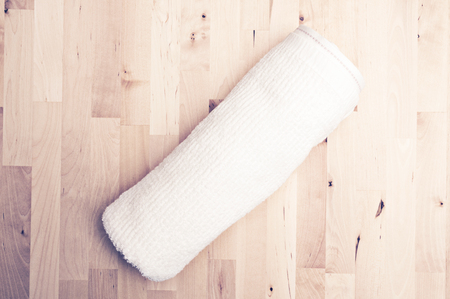 Towel and wooden tableの写真素材