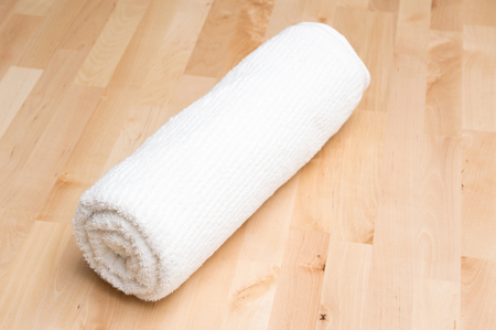 Towel and wooden tableの写真素材