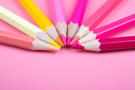 color pencils on red backgroundの写真素材