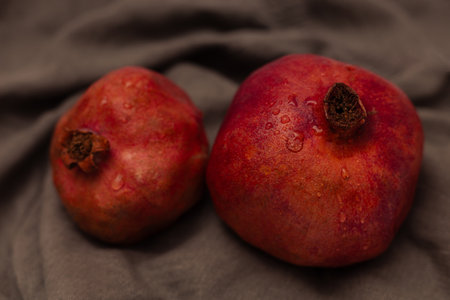 Pomegranate on canvas grey backgroundの写真素材