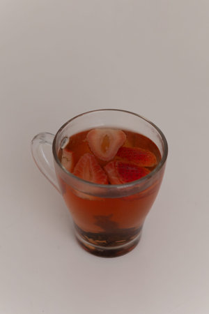 Refreshing Strawberry Tea in a Clear Glass Cup