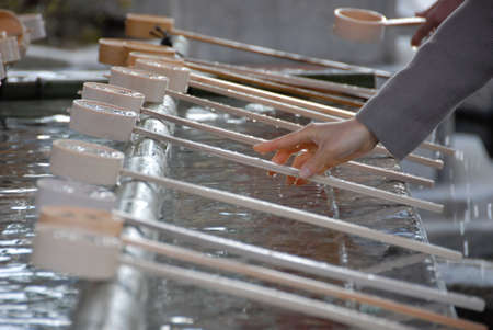 bamboo ladle for cleansing ritual before entering a Japanese templeの写真素材