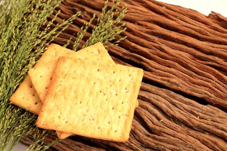 Crackers on woodの写真素材