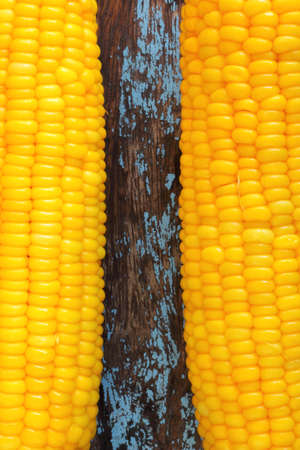 Sweet corn on woodの写真素材