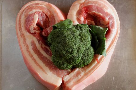 Streaky pork heart and broccoliの写真素材