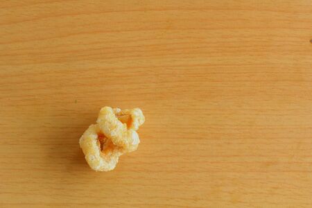 Fried Pork Skin on woodの写真素材