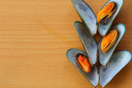 Mussel on wood backgroundの写真素材