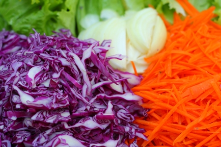Salad on wood background.の写真素材