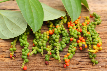 Fresh green peper on wood.