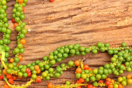Fresh green peper on wood の写真素材