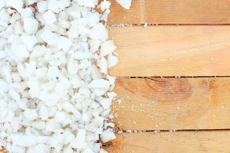 Sea salt on wood background