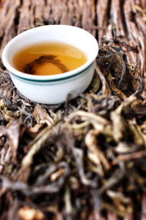 Hot tea on the wood background - Chinese style.