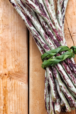 Purple yard long bean on wood backgroundの写真素材