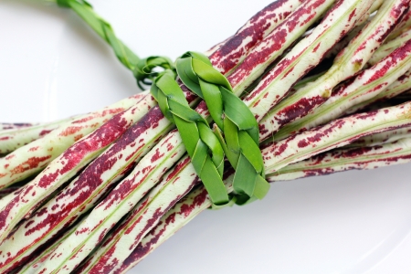 Purple yard long bean on wood backgroundの写真素材