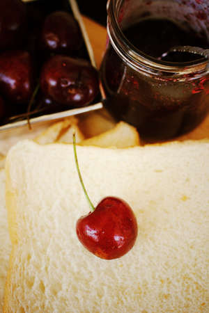 Cherry jam and fresh ripe cherriesの写真素材