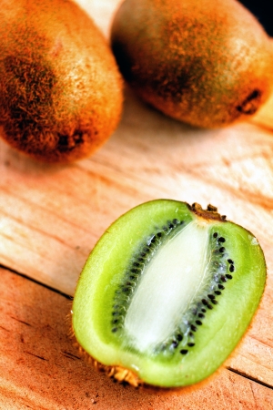 Kiwi fruite on wood backgroundの写真素材