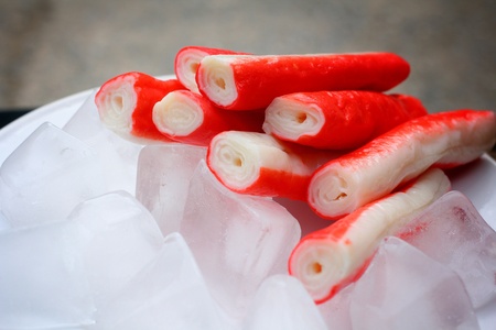 crab sticks on black backgroundの写真素材