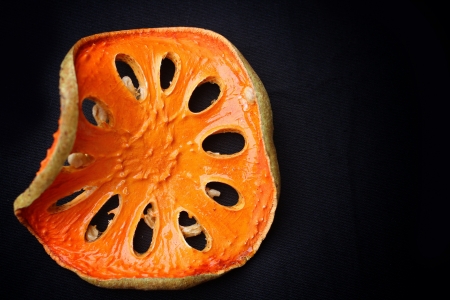 Slices of dried bael fruitの写真素材