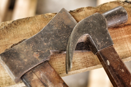 Old axe on the woodの写真素材