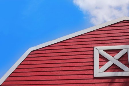 Red barn on blue skyの写真素材