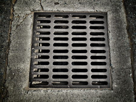 Iron drain on the road