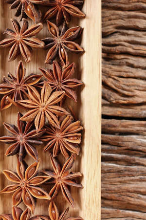 Star anise on wood backgroundの写真素材
