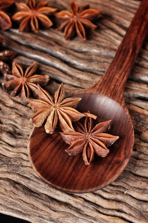 Star anise on wood backgroundの写真素材