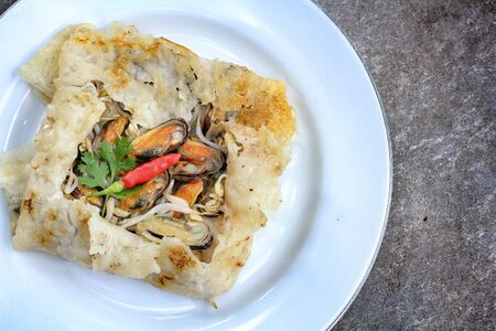 Mussels fried in egg batterの写真素材