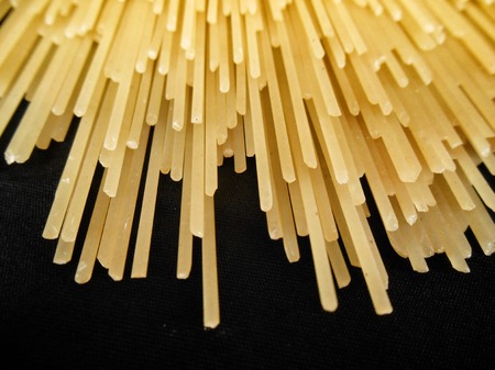pasta spaghetti on black backgroundの写真素材