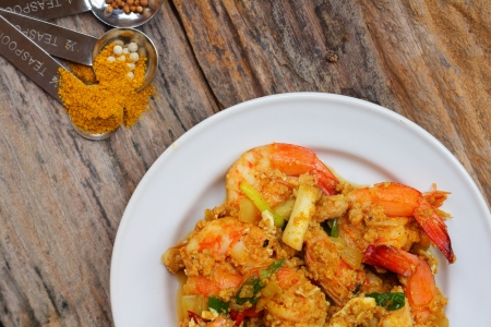 Shrimp curry - Fried shrimp with curry powderの写真素材