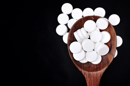 Paracetamol pill on black backgroundの写真素材