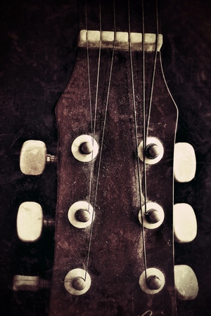 closeup of guitar on black backgroundの写真素材