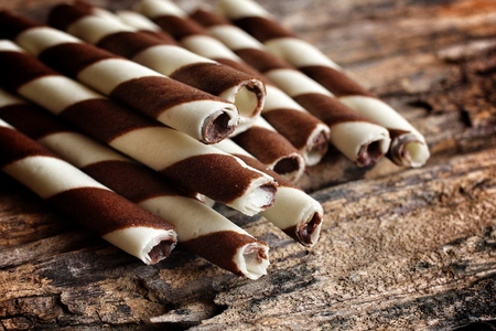 Wafer roll sticks on wood backgroundの写真素材