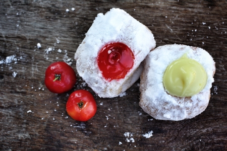 close-up of donut and strawberry jamの写真素材