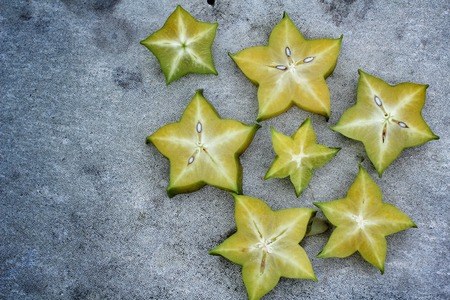 star fruit on gray の写真素材